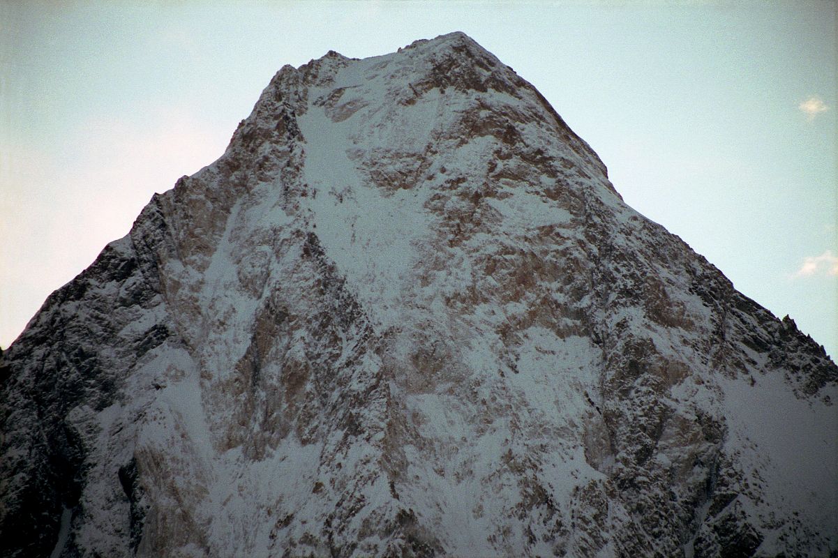 20 Gasherbrum IV Close Up At Sunrise From Concordia Gasherbrum IV close up at sunrise from Concordia. On June 22, 1986 Greg Child, Tim Mcartney-Snape, and Tom Hargis climbed to the North Summit and traversed 450m horizontally to the true Gasherbrum IV Summit, completing the first ascent of the Gasherbrum IV Northwest Ridge. �We functioned as a single being. Now on the summit, that being, drunk with euphoria, felt suddenly as if it had been merged with sky and mountain as well to become a single, elemental entity.� - Thin Air: Encounters In The Himalaya by Greg Child.